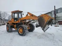 Уборка снега погрузчиком универсальным АМКОДОР