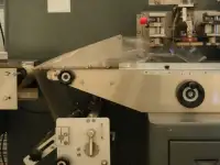 Горизонтальная упаковочная машина ALD 450Х с нижней подачей пленки