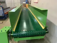 Ленточный конвейер для мойки грузов во время движения, фотография 4