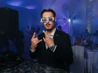 Ведущий