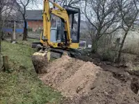 Услуги миниэкскаватора
