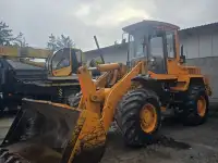 Погрузочно-разгрузочные работы, планировка участка, засыпка погрузчиком универсальным Амкодор 342С4