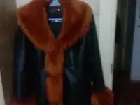 Кожаное пальто с мехом
