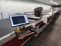 Автоматизированный раскройный комплекс для массового раскроя рулонных материалов, фотография 6