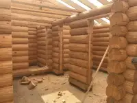 Ручная рубка срубов домов и бань из зимнего леса, фотография 3