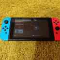Nintendo switch б/у с чехлом, фотография 2