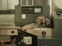 Горизонтальная упаковочная машина ALD 450Х с нижней подачей пленки, фотография 3