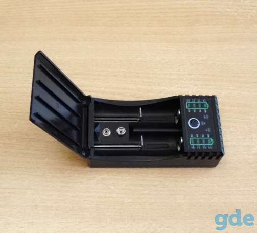 Зарядное устройство BTY V202+ (с дефектом). Дефект: левый слот заряжает медленно. Комплект: инструкция, коробка., фотография 2