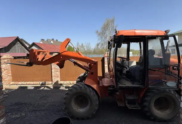 Фронтальный погрузчик БМЕ 1560, фотография 1