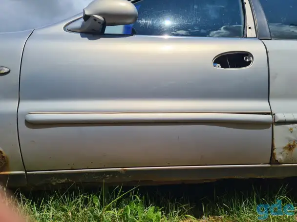 Водительская дверь Kia Clarus, фотография 3