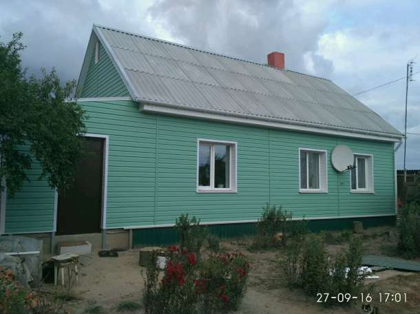 Обшивка дома сайдингом, фотография 7