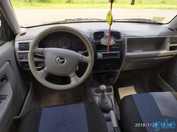 Продам авто Mazda Demio, фотография 9