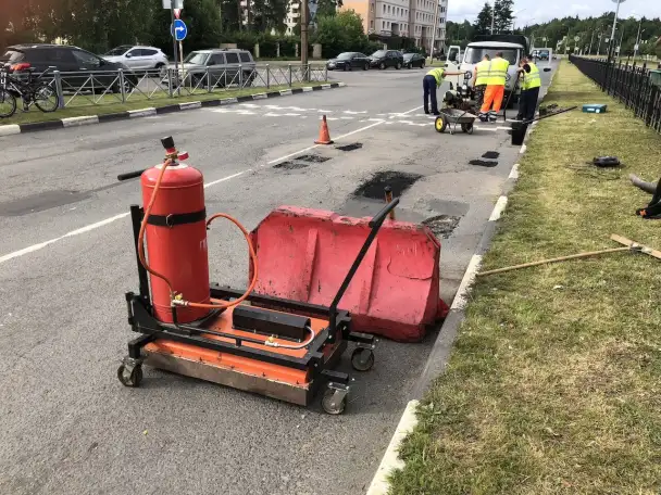 ямочный ремонт дорог и кровли установки УИ, фотография 2