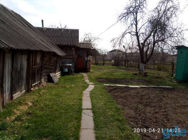Продается в г/п Ивенец 1/2 доля квартиры в 2-х квартирном бревенчатом доме, фотография 2