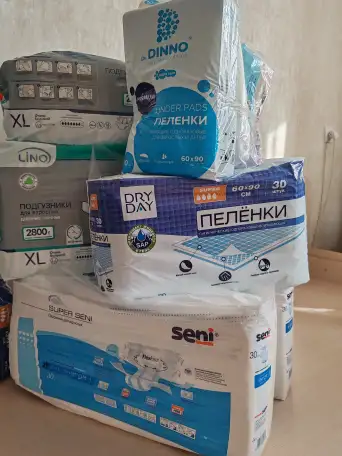 Подгузники для взрослых и пеленки впитывающие, фотография 1