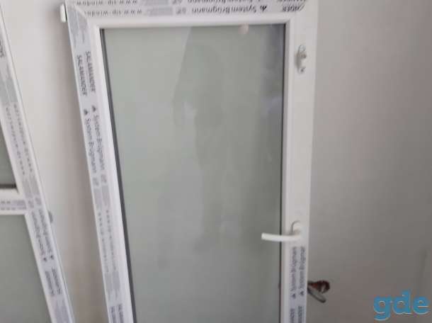Продам балконную дверь с окном из новостройки, фотография 1