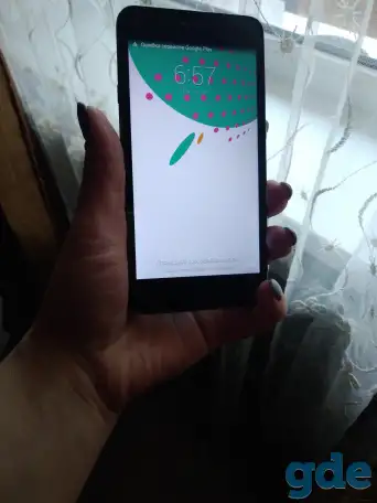 Мобильный телефон, фотография 1