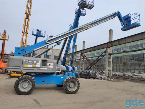 Аренда телескопического подъемника Genie S85 4x4, фотография 1