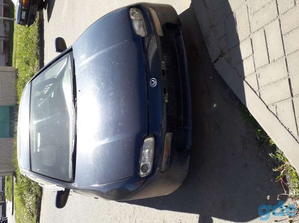 Мазда Mazda 323, фотография 1
