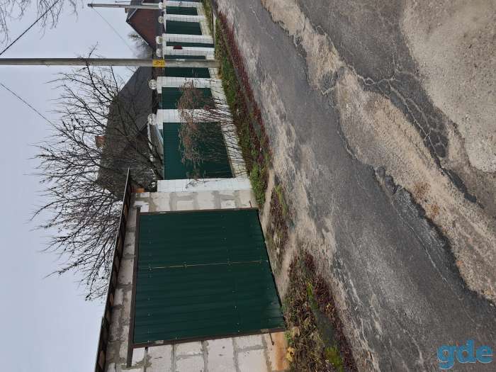 Продается пол дома и с гаражом  по улице Чапаева, фотография 1