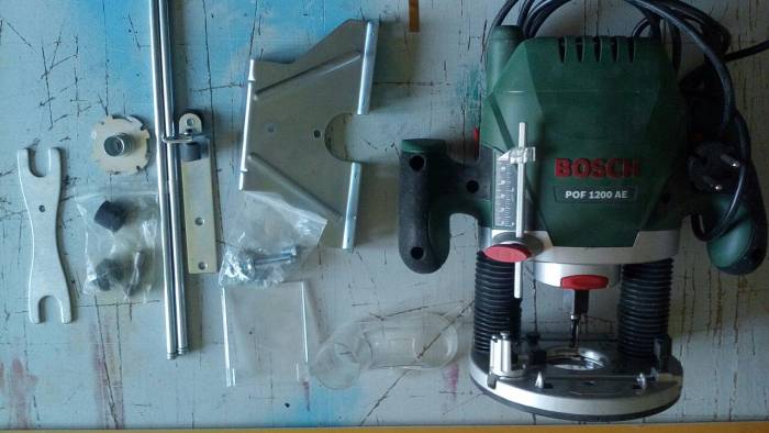 Продам ручной фрезерный станок bosch pof 1200 ae, фотография 1