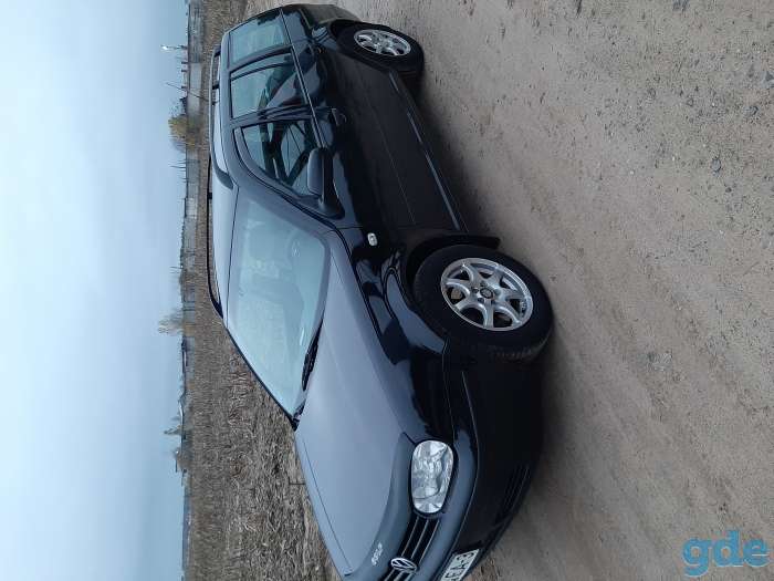 Автомобиль Volkswagen Golf IV, фотография 10