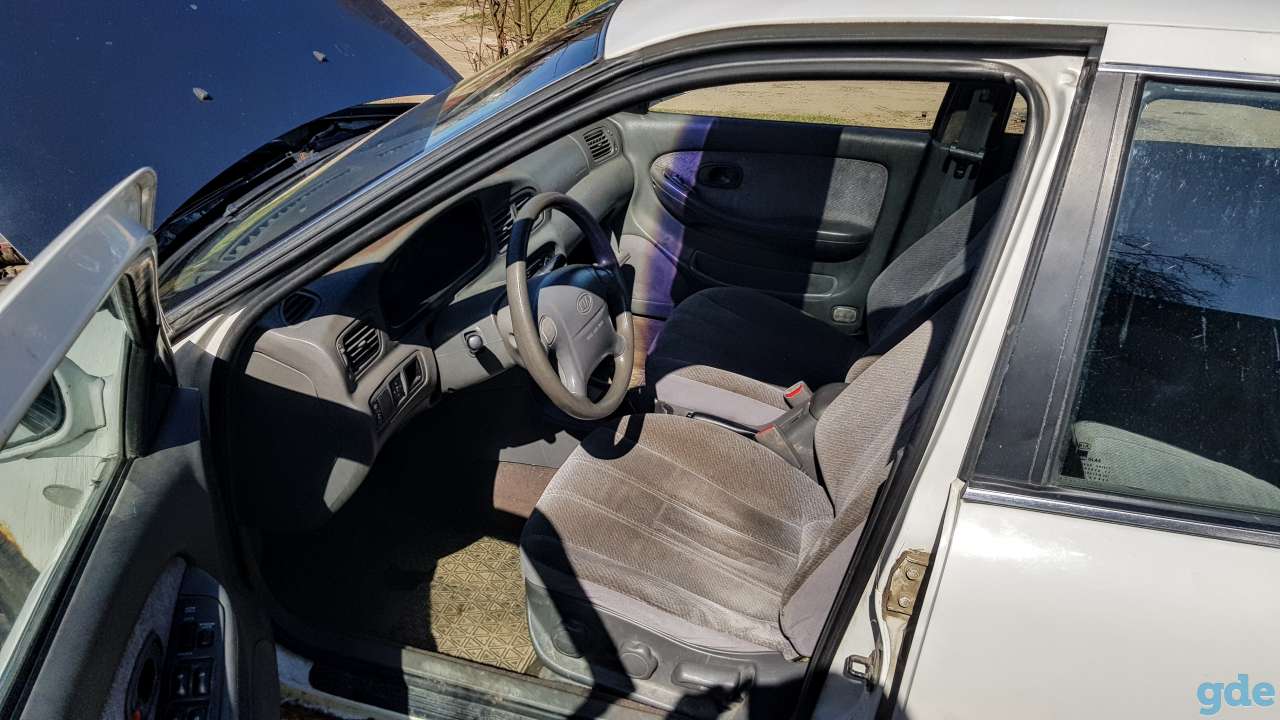 Салон целиком Kia Clarus, фотография 3