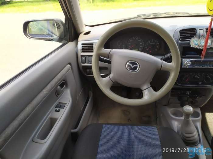 Продам авто Mazda Demio, фотография 8
