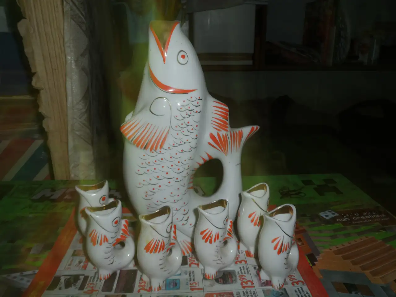Фарфоровые рыбки и рог, фотография 1