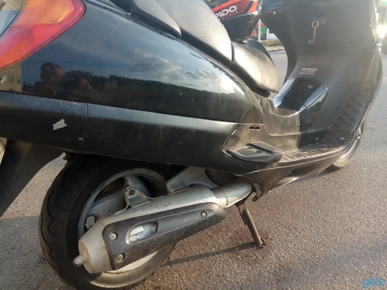 Honda Pantheon 125 двухтактный максискутер, фотография 2