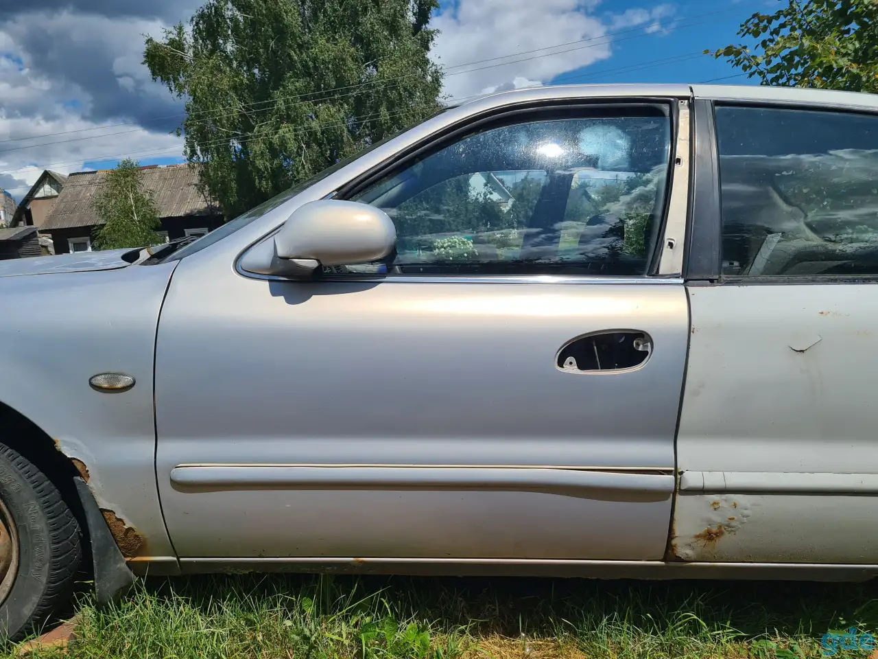Водительская дверь Kia Clarus, фотография 1