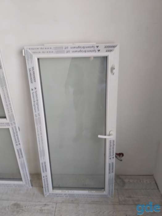 Продам балконную дверь с окном из новостройки, фотография 1