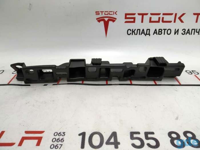 Зап. части для авто Tesla. Кронштейн крепления верхний фронтальн.левый накладки дверного проёма двери сокола Tesla model, фотография 1