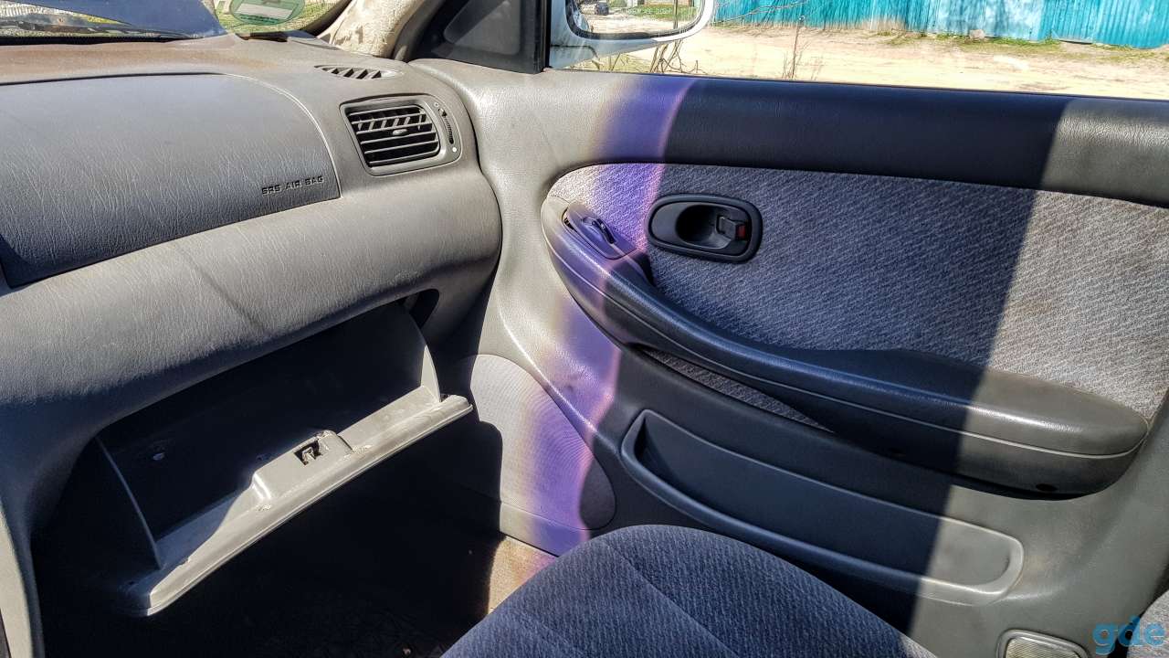 Салон целиком Kia Clarus, фотография 7