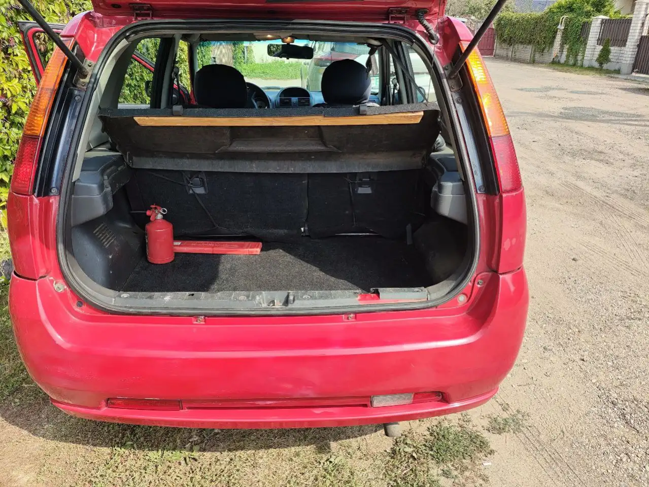 Автомобиль SUZUKI IGNES 2004 года., фотография 3