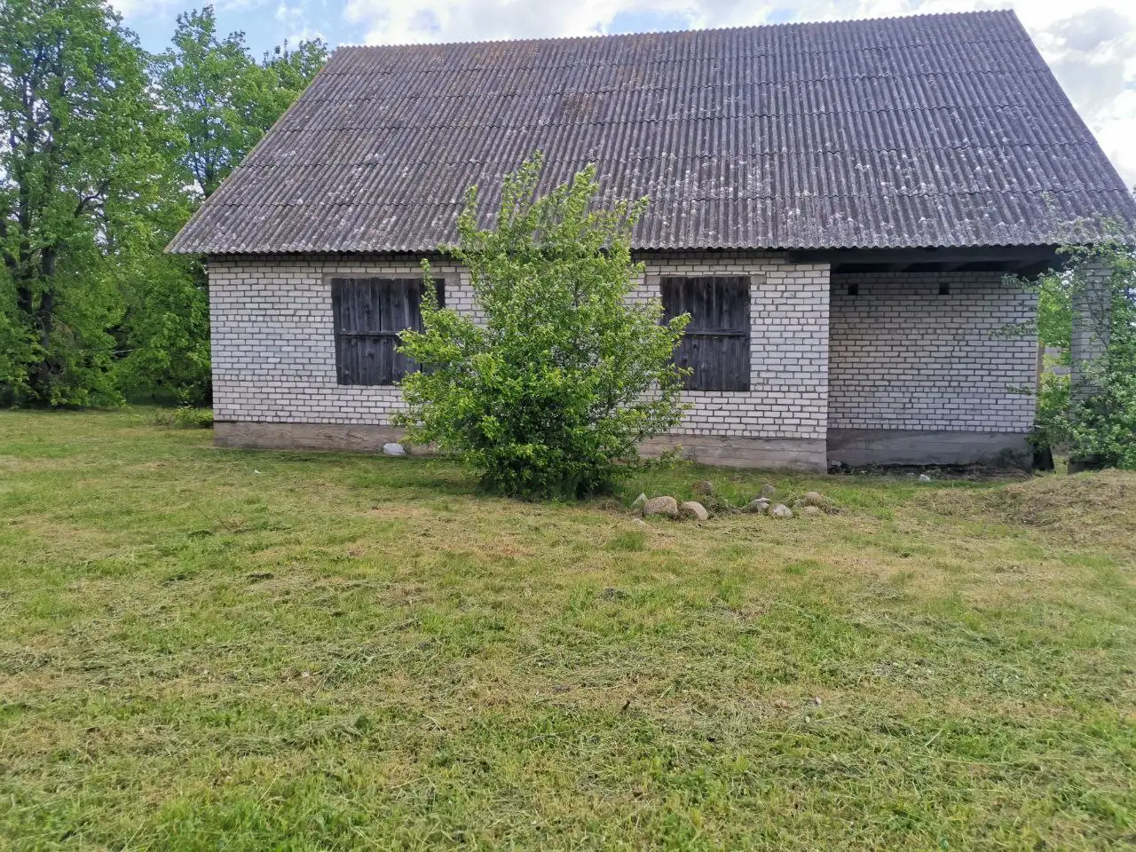 Участок в аг. Шашки с недостроенным домом, фотография 2